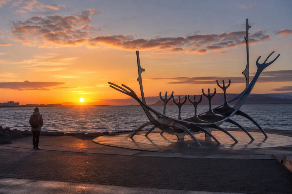 A view of the Sun Voyager sculpture on the Reykjavík waterfront at sunset