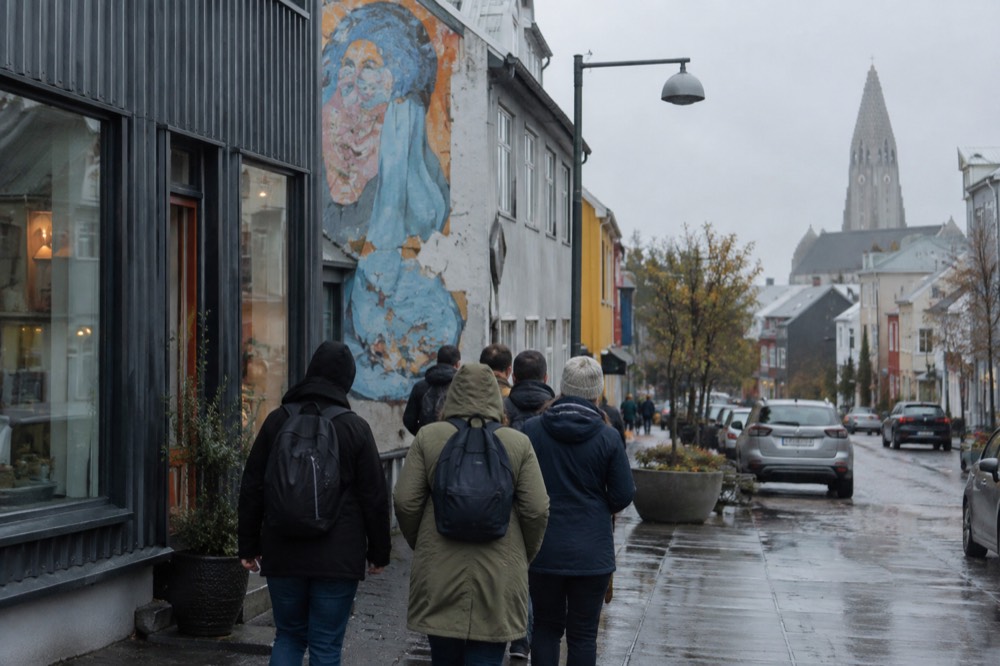Guided walking group standing on a Reykjavik street corner